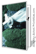 White cross with greenery